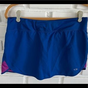 Champion Royal blue tennis skort, fuchsia accents